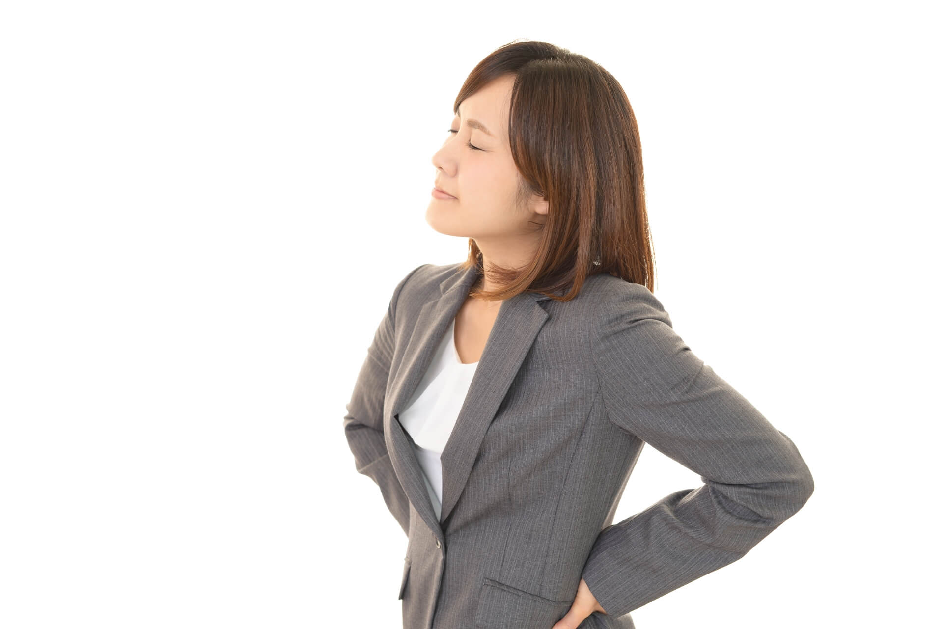 腰を痛めている女性